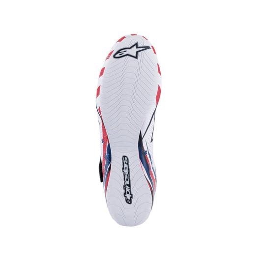 White Alpinestars Supermono v2 Grand Prix Racing sports shoe with red and blue accents on a white background