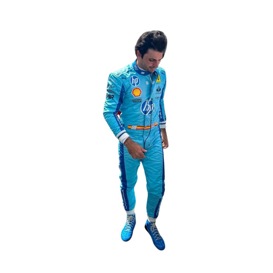 Front view of Carlos Sainz Jr’s 2024 Miami GP F1 racing suit in striking light blue with navy blue side panels and yellow accent branding.