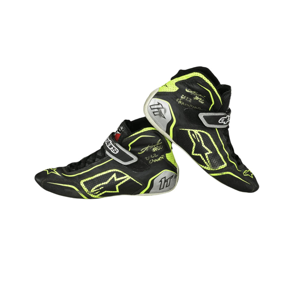 Black and yellow Linus Lunqvist Championship HMD 2022 Indy Lights racing boots on a white background