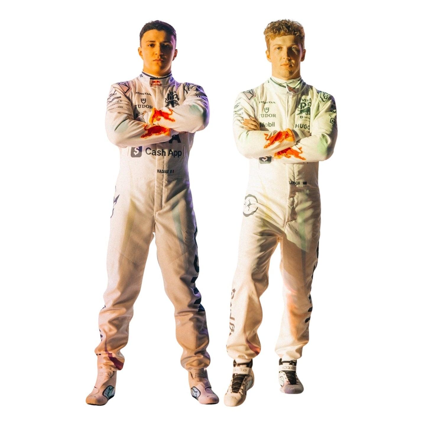 Two individuals in racing suits standing against a white background