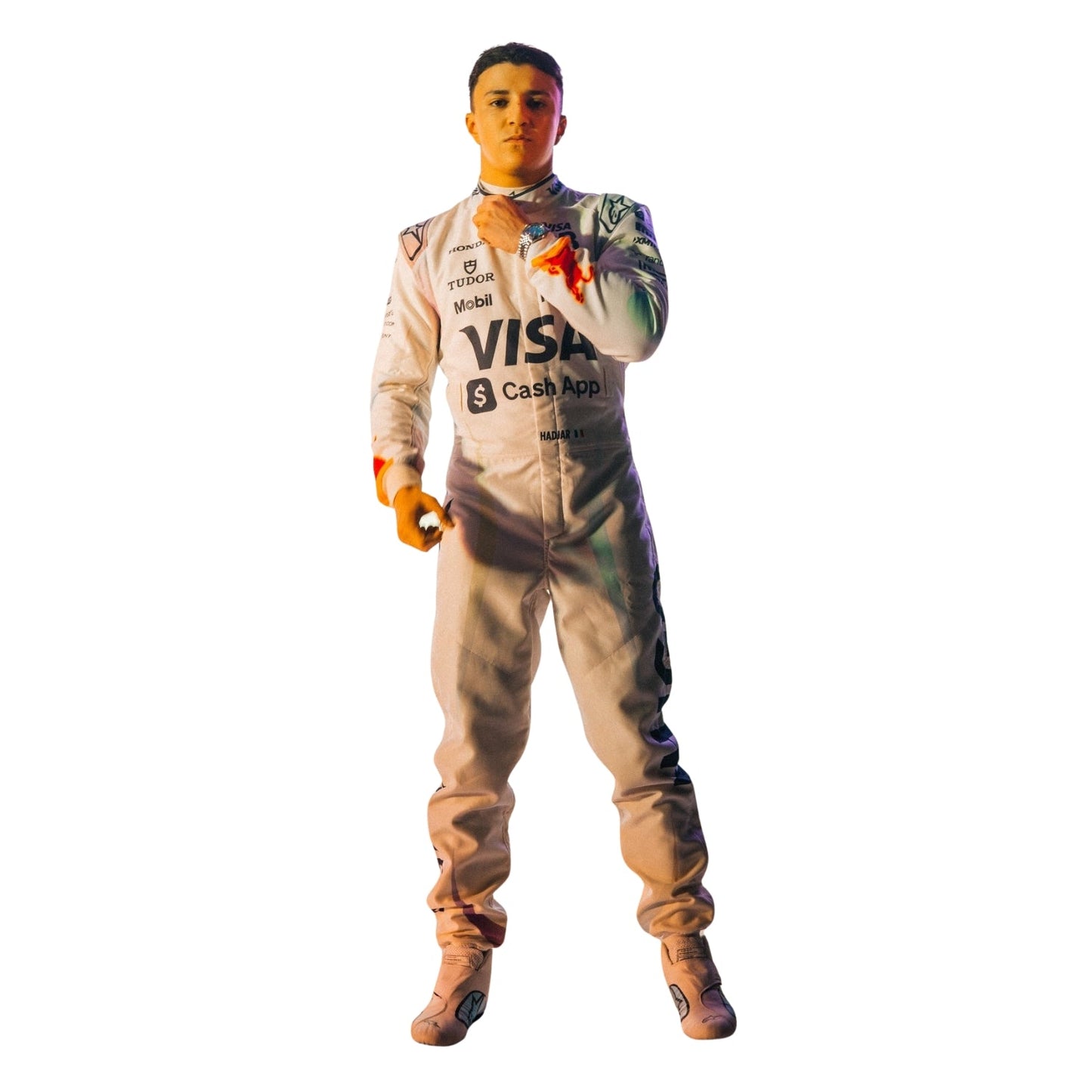 Isack Full View of wearing a racing suit with visible branding on a white background