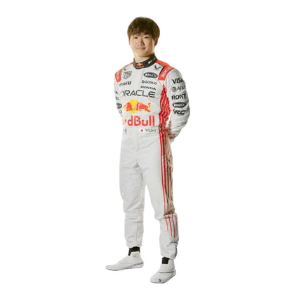 Yuki Tsunoda's 2025 Japanese Grand Prix race suit front view, showcasing a predominantly white design with blue side panels and green accents around the shoulders.