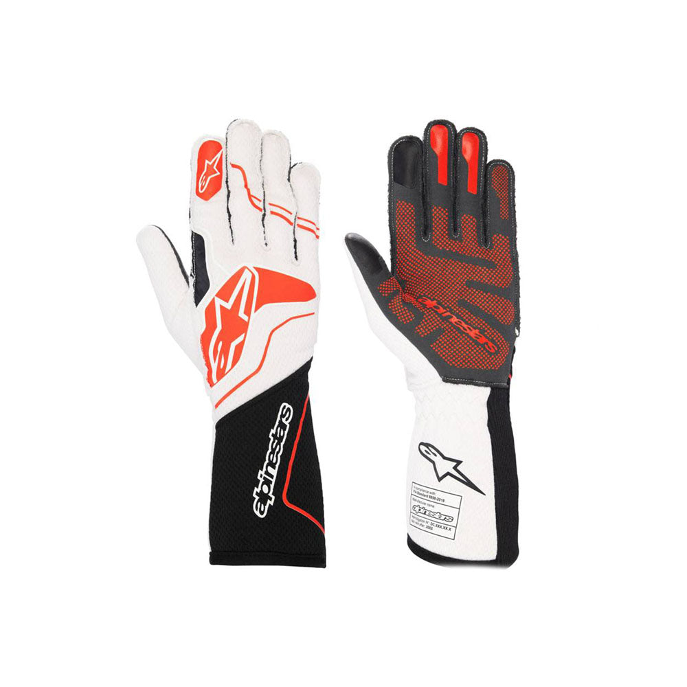 Pair of black, white, and red ALPINESTARS TECH-1 ZX V2-CYBUL racing gloves on a white background