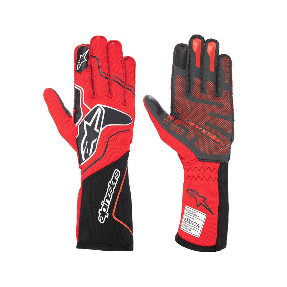 Red and black ALPINESTARS TECH-1 ZX V2-CYBUL racing gloves with visible branding on a white background
