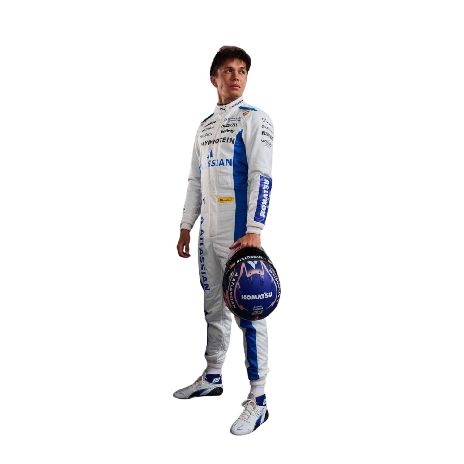 Side profile of Alex Albon in his 2025 Formula 1 racing suit, displaying the ergonomic fit and the interplay of white and blue fabrics, enhanced by subtle detailing along the side seams and sponsor branding.