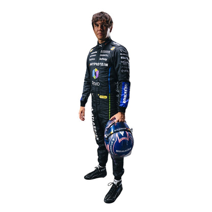 Alexander wearing a 2025 las vegas racing suit holding a helmet on a white background