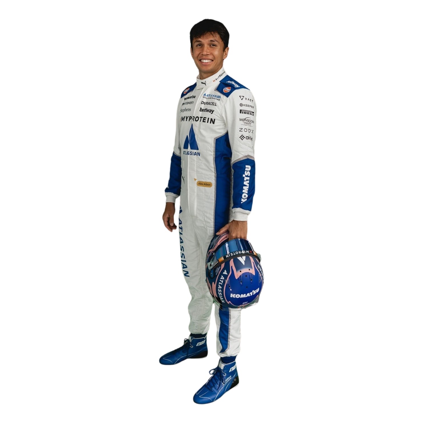 Alexander albon in a 2025 united states gp racing suit holding a helmet on a white background