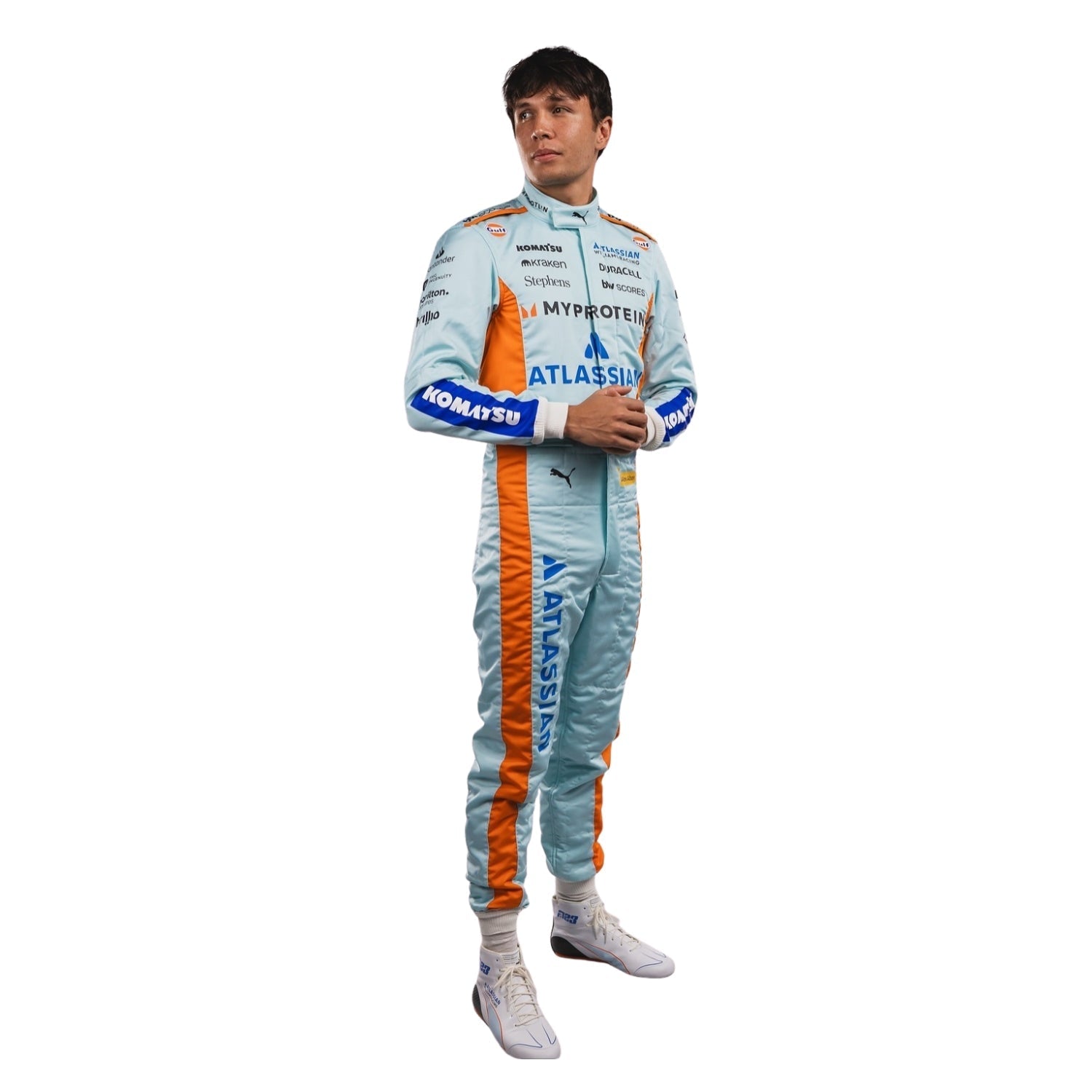 Alexander Albon wearing a light blue F1 racing suit in 2025 Sao Paul GP with orange accents on a white background