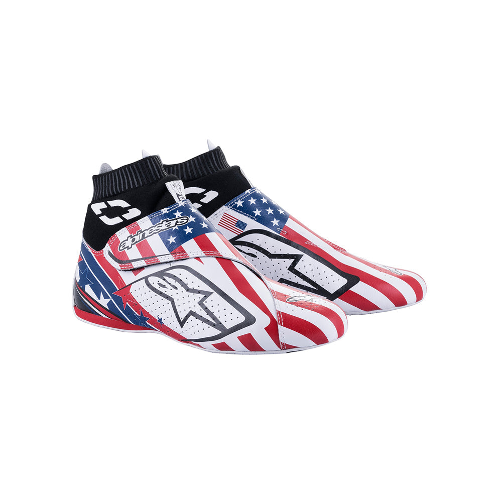 Pair of Alpinestars Supermono v2 Grand Prix Racing shoes with American flag design on a white background