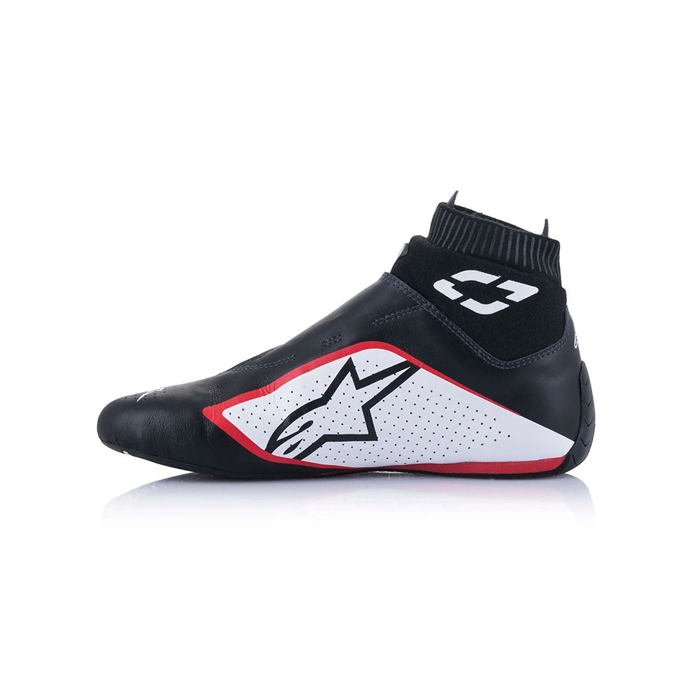 Black and red Alpinestars Supermono v2 racing shoe with a logo on a white background