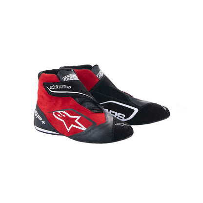 Red and black Alpinestars Supermono v2 racing boots with a brand logo on a white background