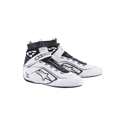 White and black Alpinestars Tech1-Zv2 racing shoes with visible branding on a white background