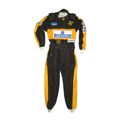 Front view of Ayrton Senna's 1985 F1 racing suit in bright red with white sponsor patches, capturing his iconic style and fearless attitude on the track.