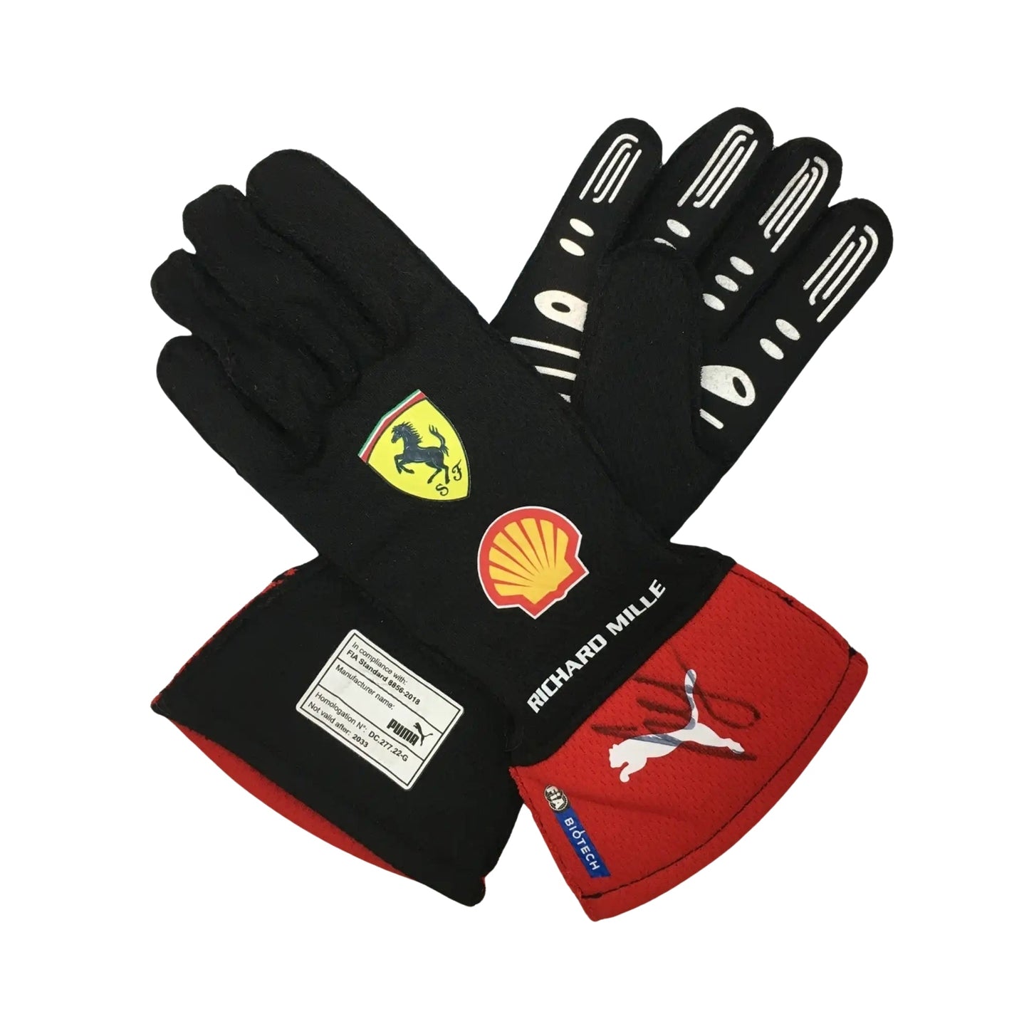 Pair of black Carlos Sainz Jr 2023 F1 racing gloves with logos on a white background