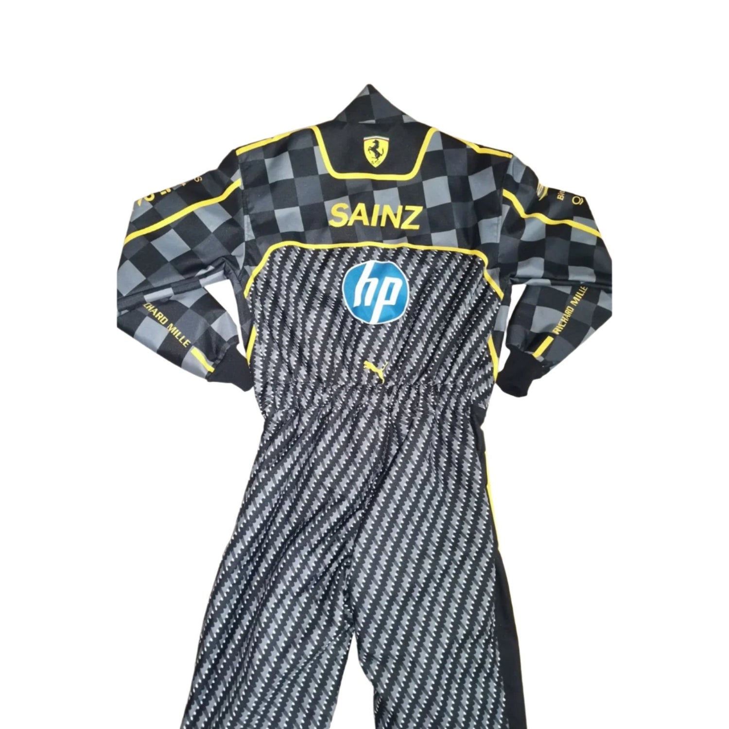 Rear view of the 2024 Italian GP race suit worn by Carlos Sainz Jr., featuring a black carbon fiber pattern with yellow detailing on the shoulders.