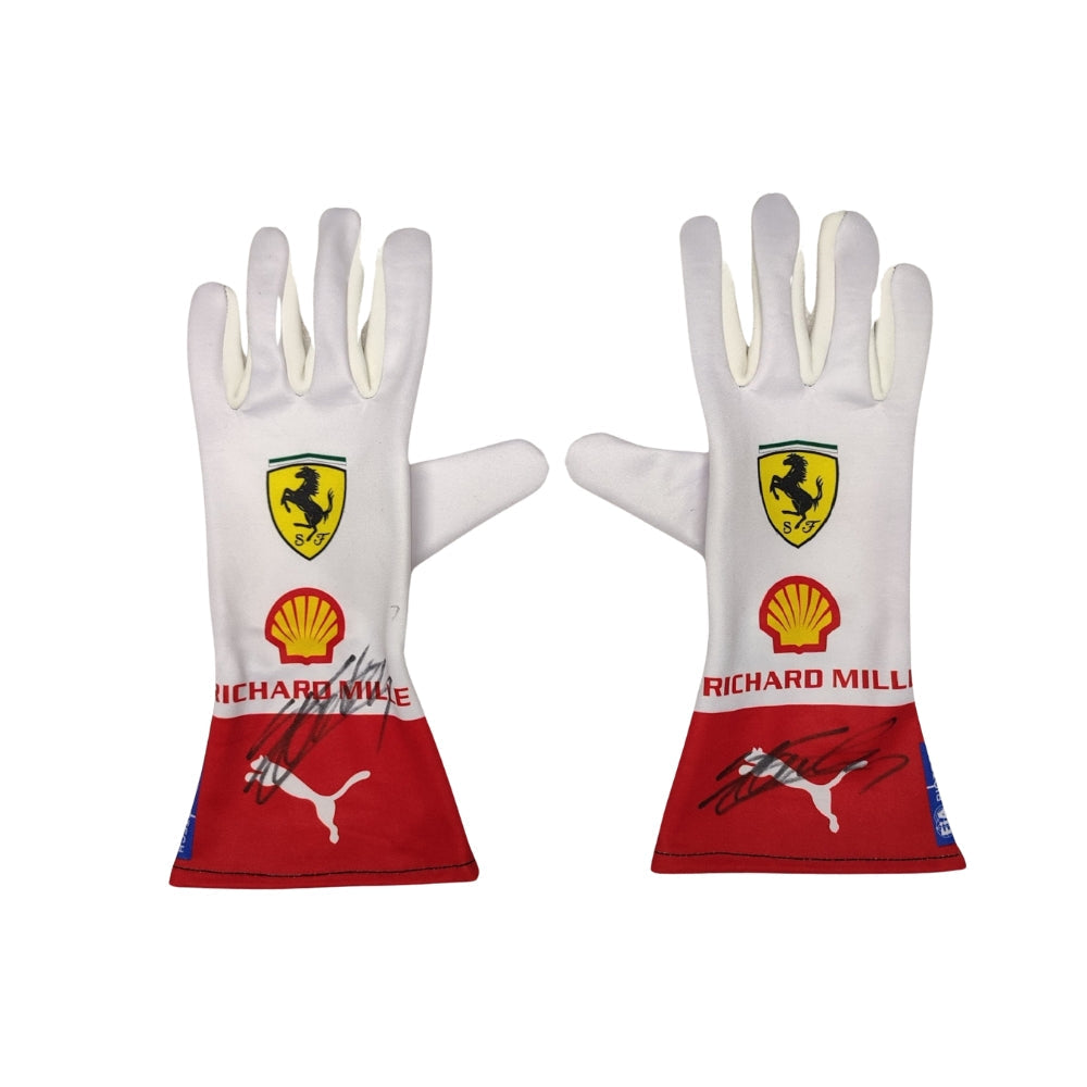 Pair of white Charles Leclerc 2023 Monaco GP F1 Racing gloves with Ferrari and Shell logos on a white background