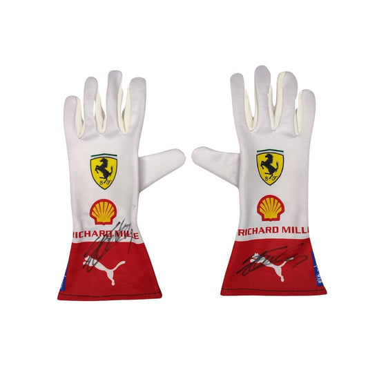 Pair of white Charles Leclerc 2023 Monaco GP F1 Racing gloves with Ferrari and Shell logos on a white background