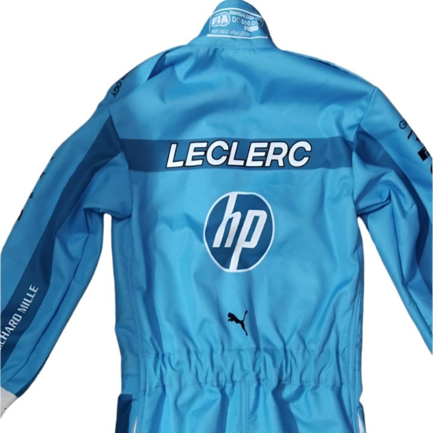 Rear view of Charles Leclerc's 2024 Miami GP race suit, featuring a blue base with yellow detailing along with prominent sponsor logos.