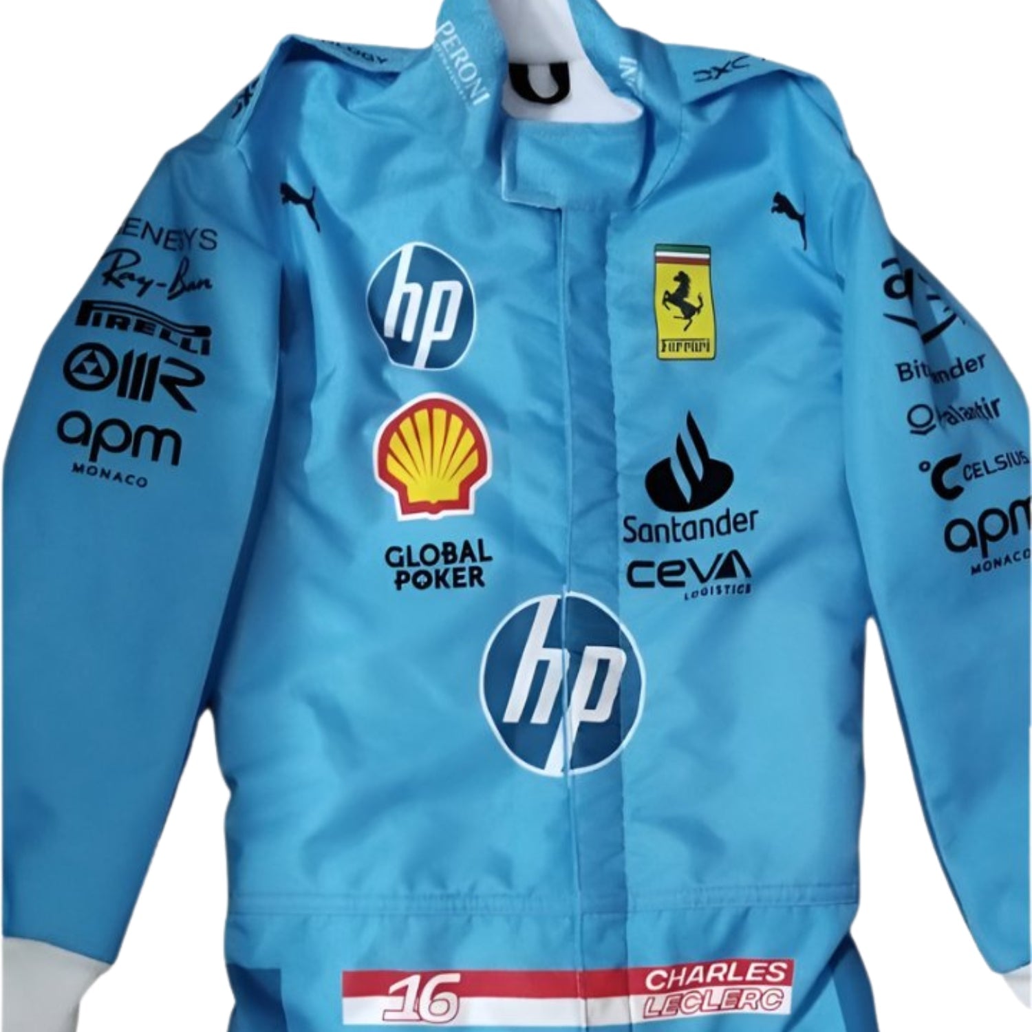 Close-up of Charles Leclerc's 2024 Miami GP race suit, displaying the intricate blue material with yellow stitching and sponsor logos.