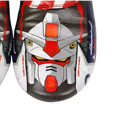 Pair of Conor Daly 2022 IndyCar Racing shoes with robot design on a white background