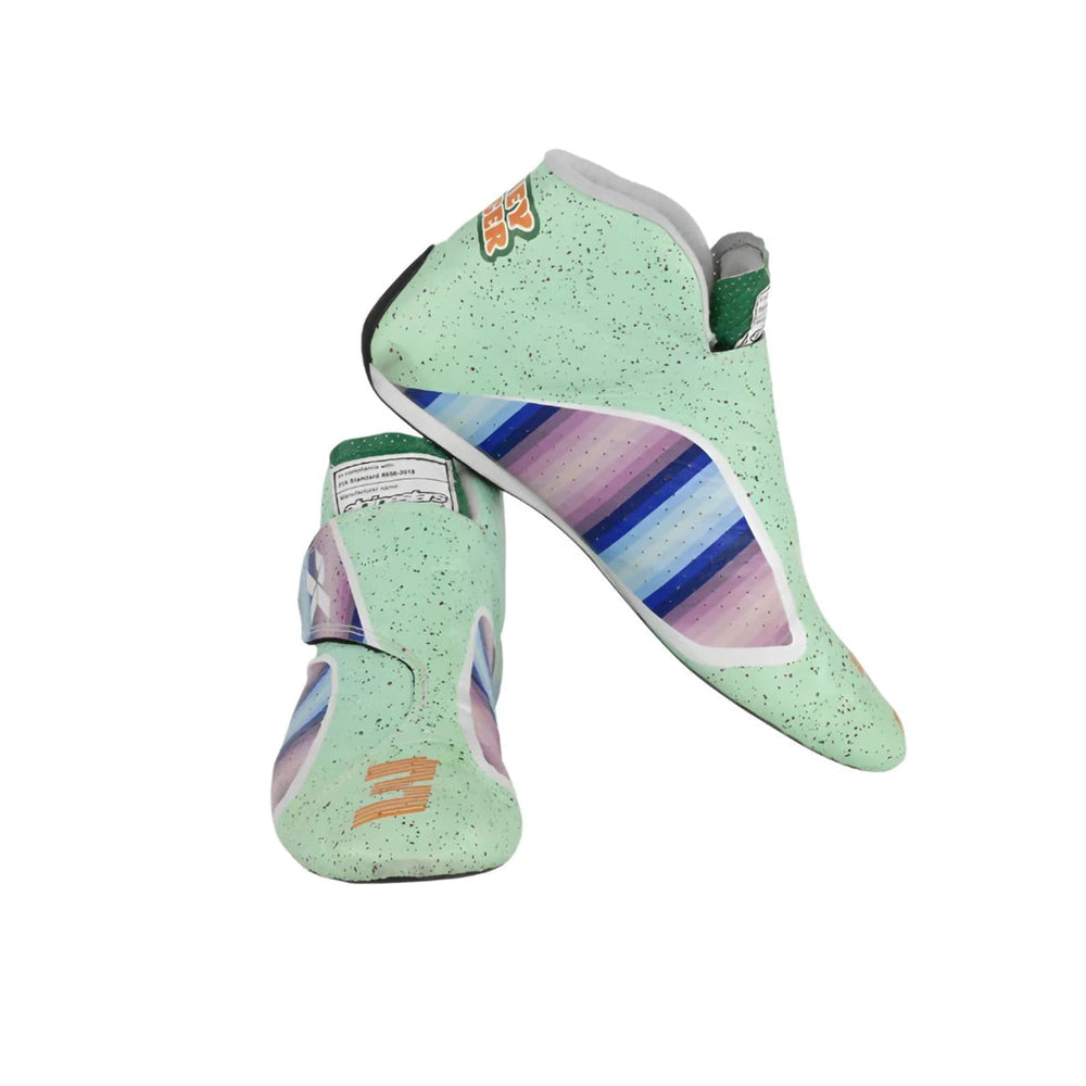 Pair of green Daniel Ricciardo 2021 Honey Badge F1 Racing shoes with colorful stripes on a white background