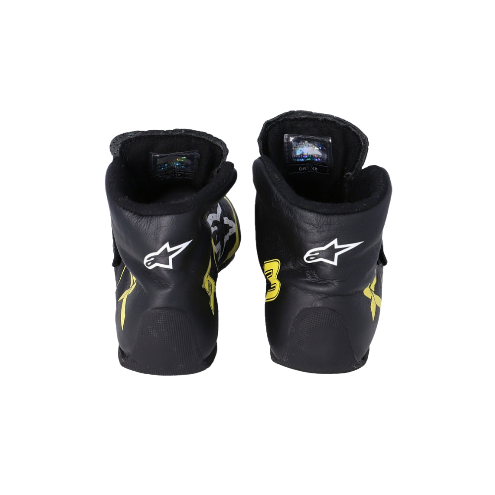 Black protective Daniel Ricciardo 2019 Race Worn F1 racing boots with brand logo on a white background
