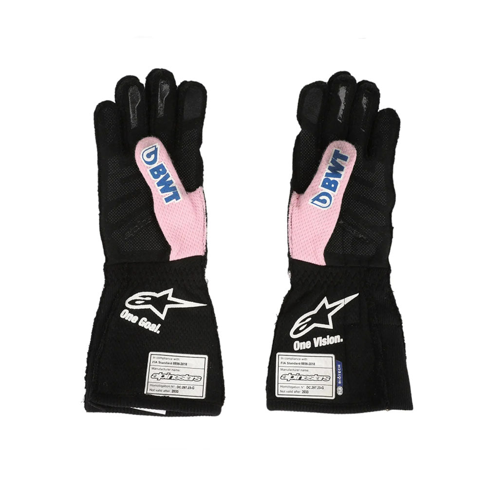 Black Esteban Ocon 2023 Miami GP F1 Racing gloves with pink accents and visible branding on a white background