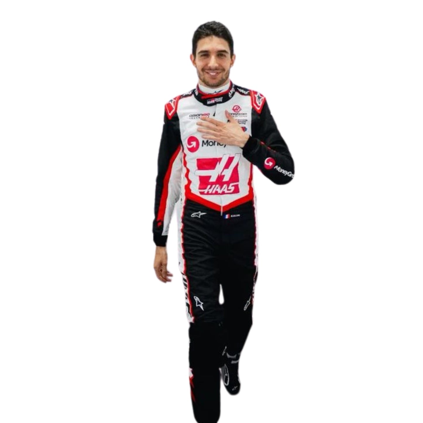 Esteban Ocon wearing a racing suit with visible branding on a white background