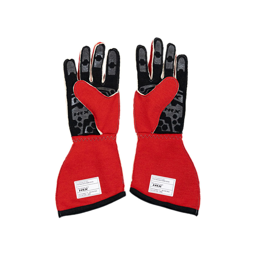 Pair of red gloves with black accents on a white background