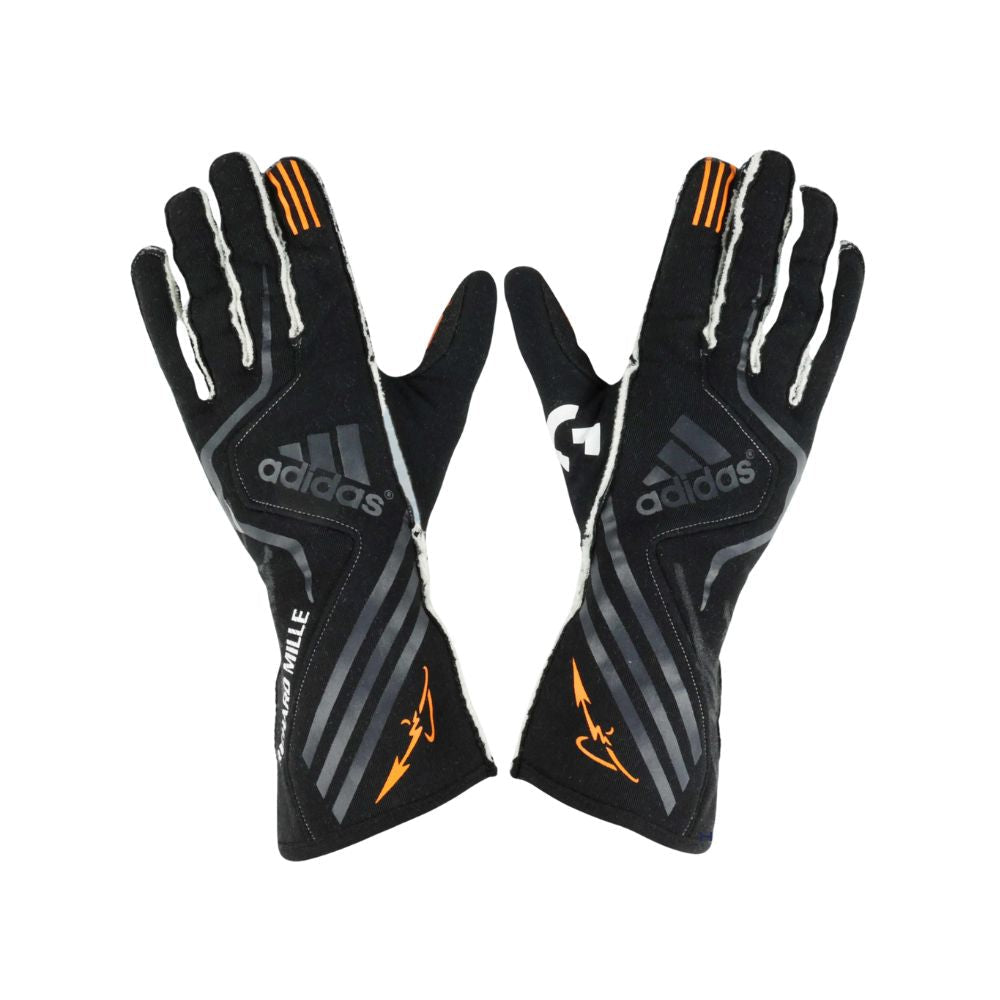 Pair of black Adidas Fernando Alonso 2017 F1 Racing gloves with orange accents on a white background