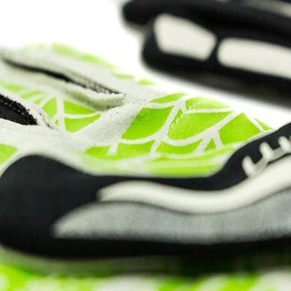 Close-up of a Freem Spider Touch 2 racing glove with green and black design