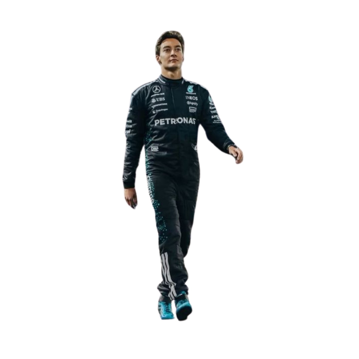 George Russell walking through the pit lane in his 2025 F1 suit, with a sharp, performance-ready appearance.


