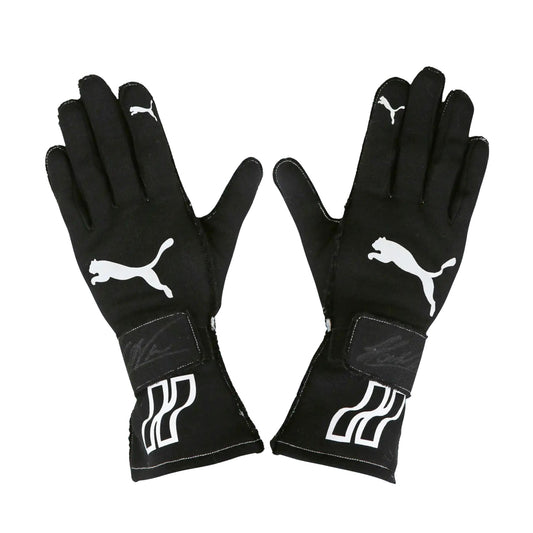 Pair of black Helio Castroneves 2017/18 IndyCar IMSA racing gloves with Puma logo on a white background