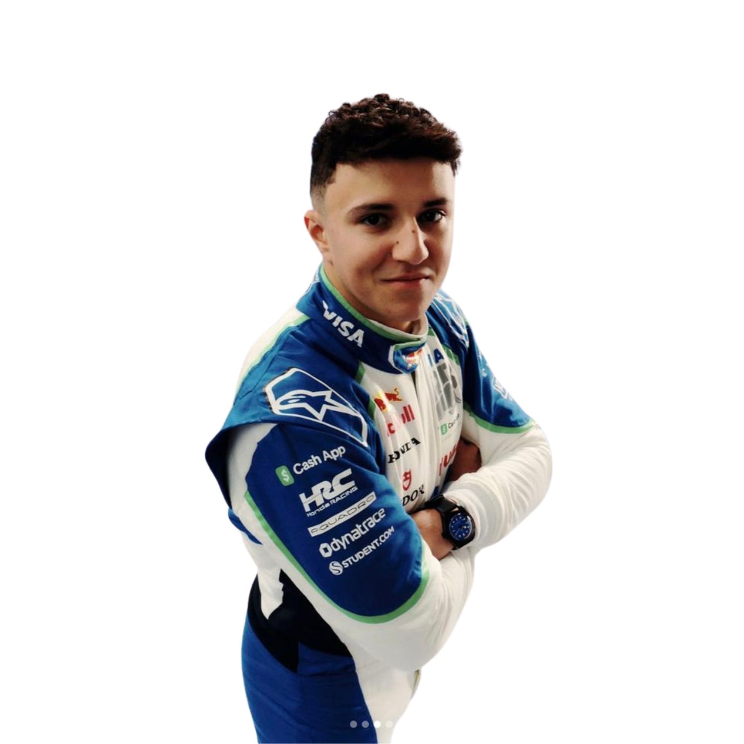 Isack Hadjar standing in his 2025 racing suit, showcasing the front design with blue and green accents.
