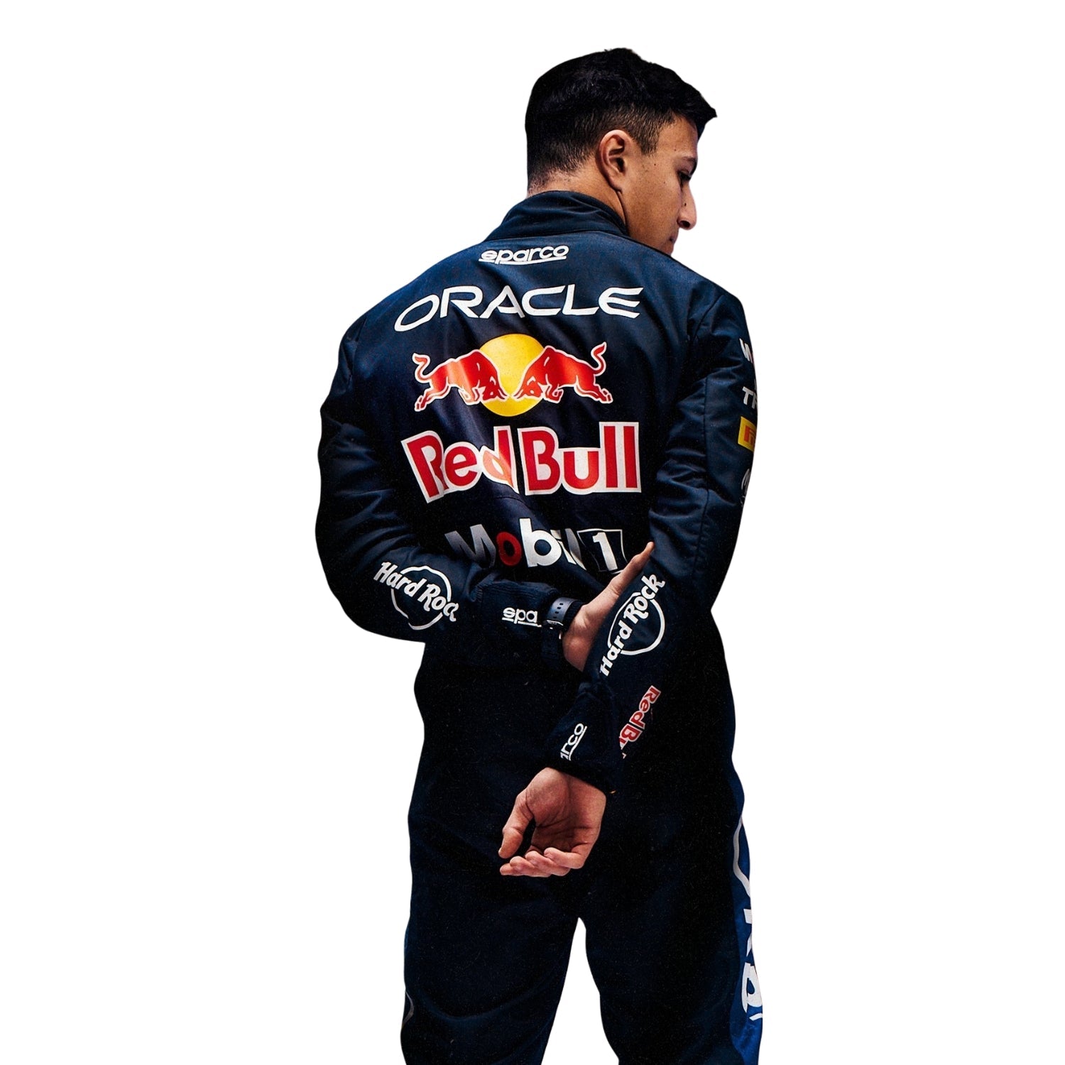 Isack wearing a dark blue racing suit with Red Bull and Oracle logos on a white background