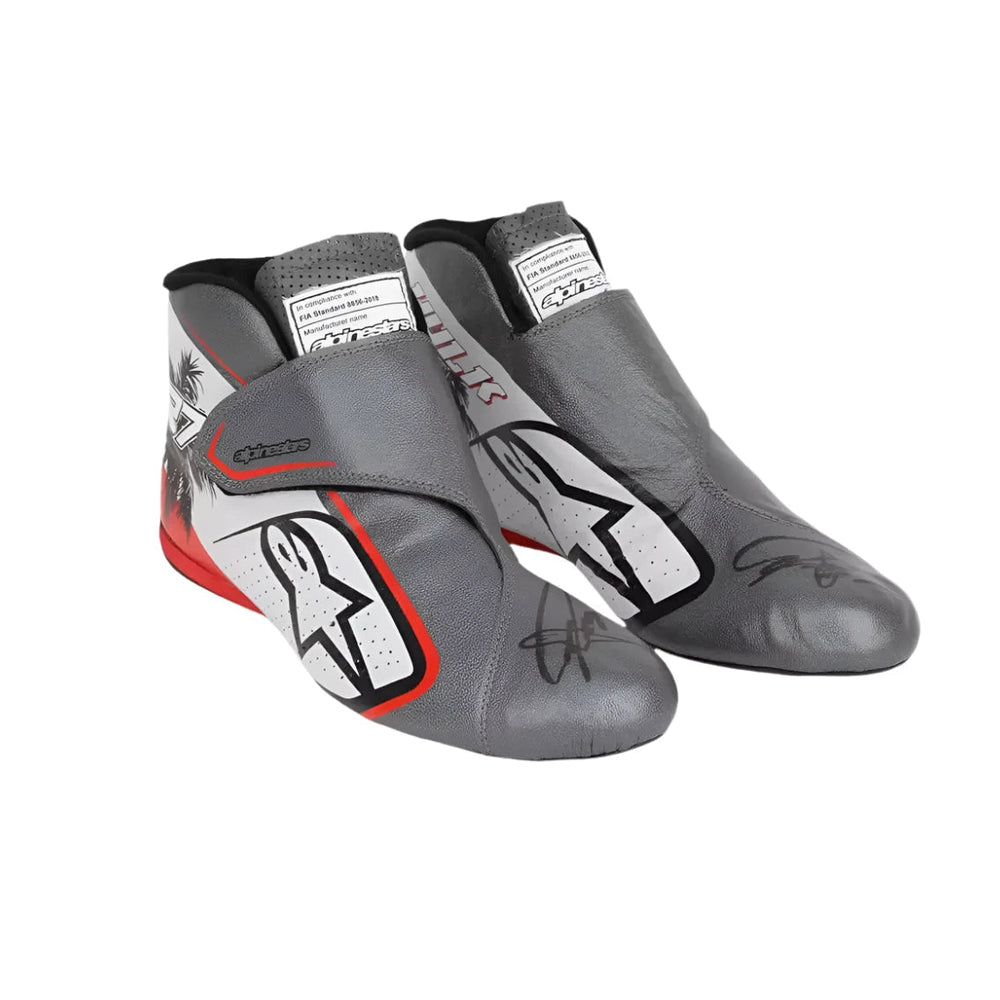 Pair of gray Kevin Magnussen 2023 Miami GP F1 Racing shoes with red accents on a white background