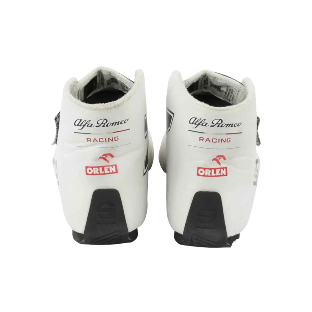 White Kimi Raikkonen 2021 F1 racing boots with Alfa Romeo and Orlen branding on a white background