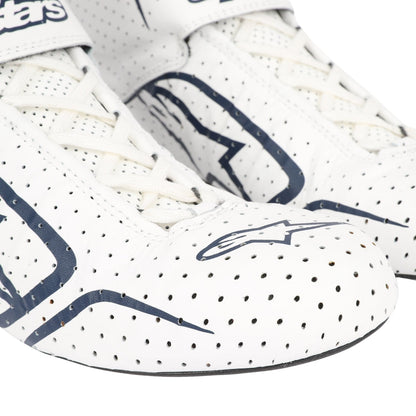 White Lance Stroll 2017 F1 racing sneakers with blue accents and perforated design on a white background