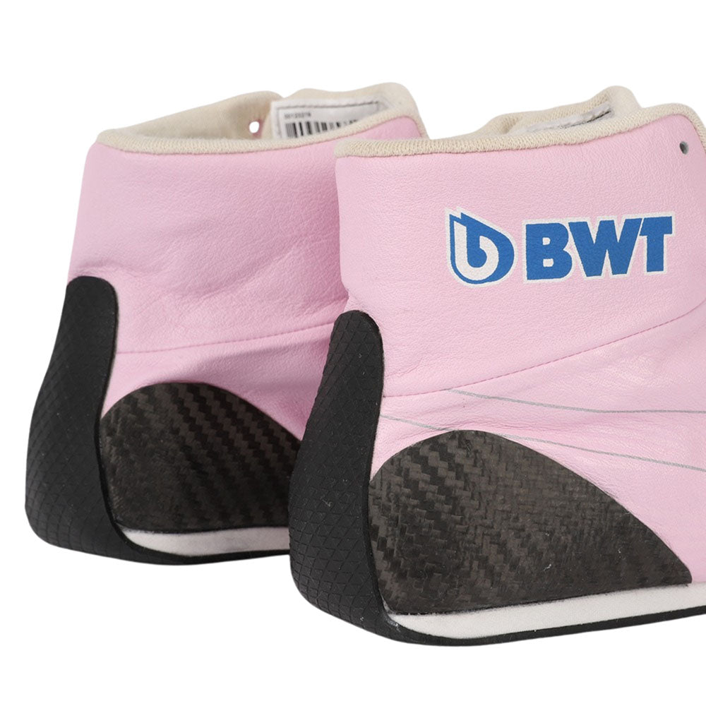 Pink protective Lance Stroll 2019 F1 Racing boots with black soles and BWT logo on a white background
