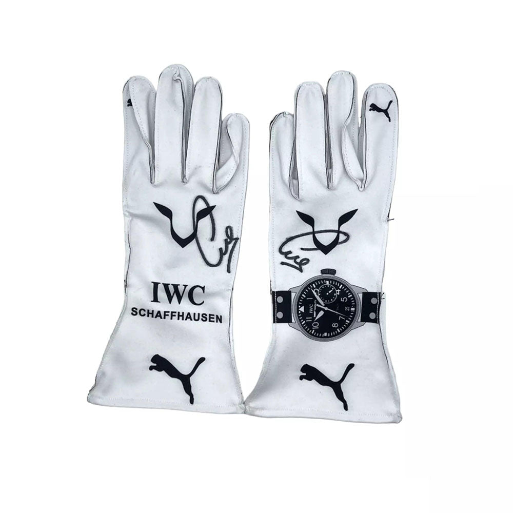White Lewis Hamilton 2018 F1 racing gloves with IWC Schaffhausen and Puma logos on a white background