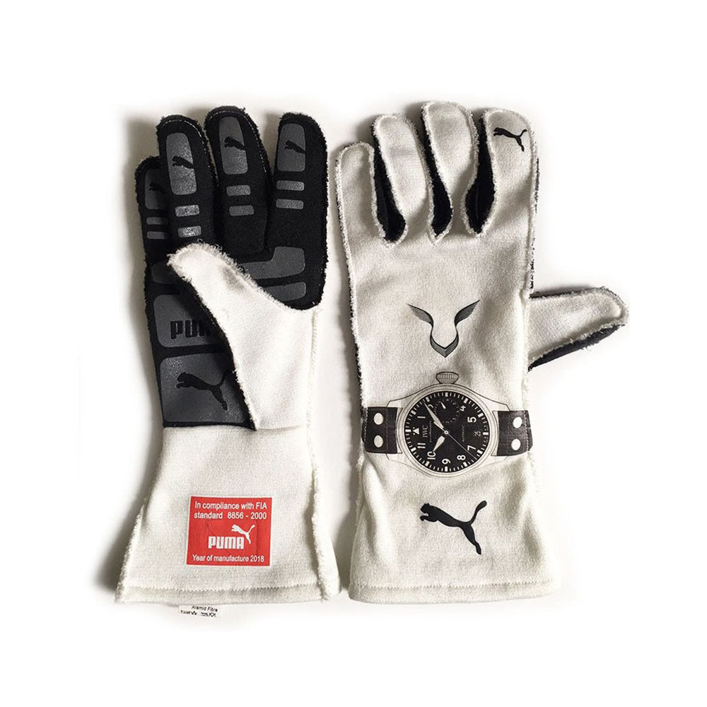 Pair of white Lewis Hamilton 2019 F1 Racing gloves with black accents and Puma logo on a white background