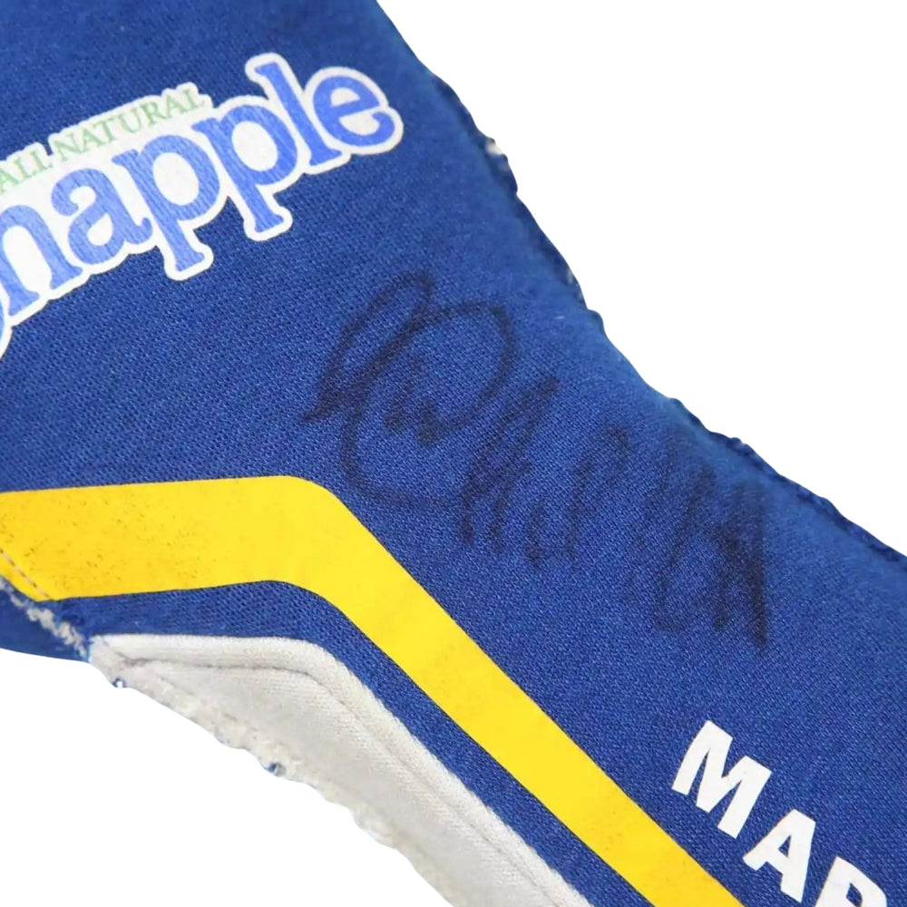Blue and yellow Marco Andretti 2014 Indy 500 racing glove with 'Snapple' branding and a signature on a white background