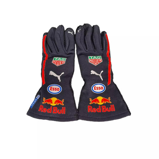 Pair of  Max Verstappen 2023 F1 racing gloves with Red Bull and Puma logos on a white background
