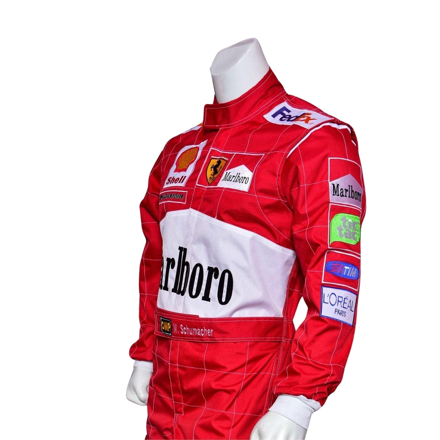 Side profile of Schumacher’s 2000 racing suit, displaying Ferrari red and clean white stripes along the torso with sponsor logos from his dominant 2000 season.