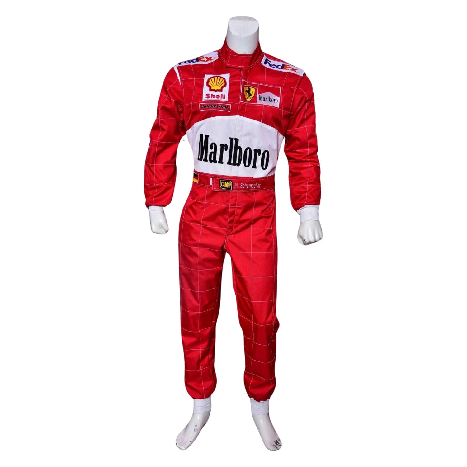 Front view of Michael Schumacher’s 2001 Belgian GP F1 racing suit in bright red, featuring stitched sponsor patches and bold yellow highlights.