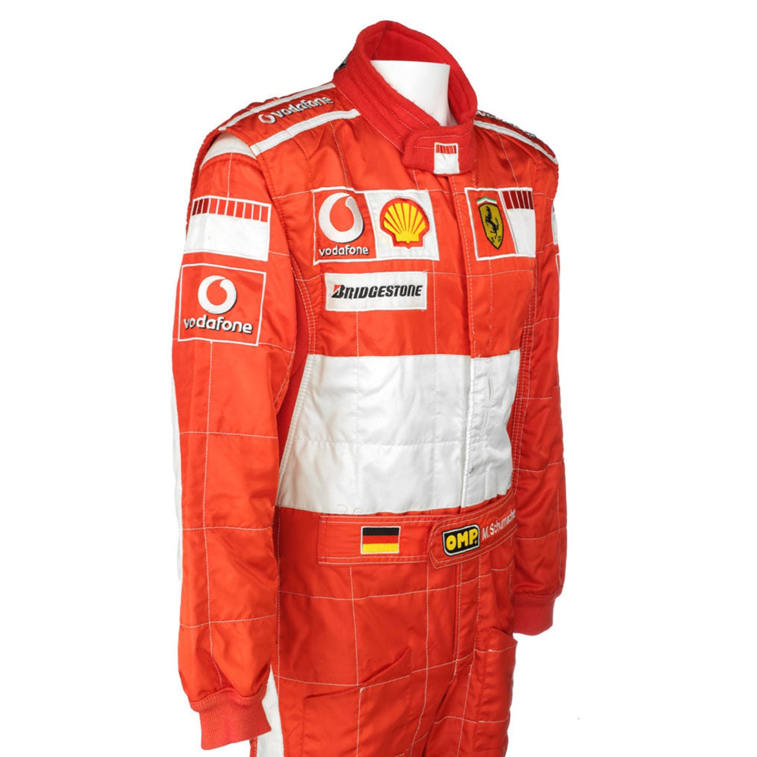 Red racing suit with various sponsor logos on a white background