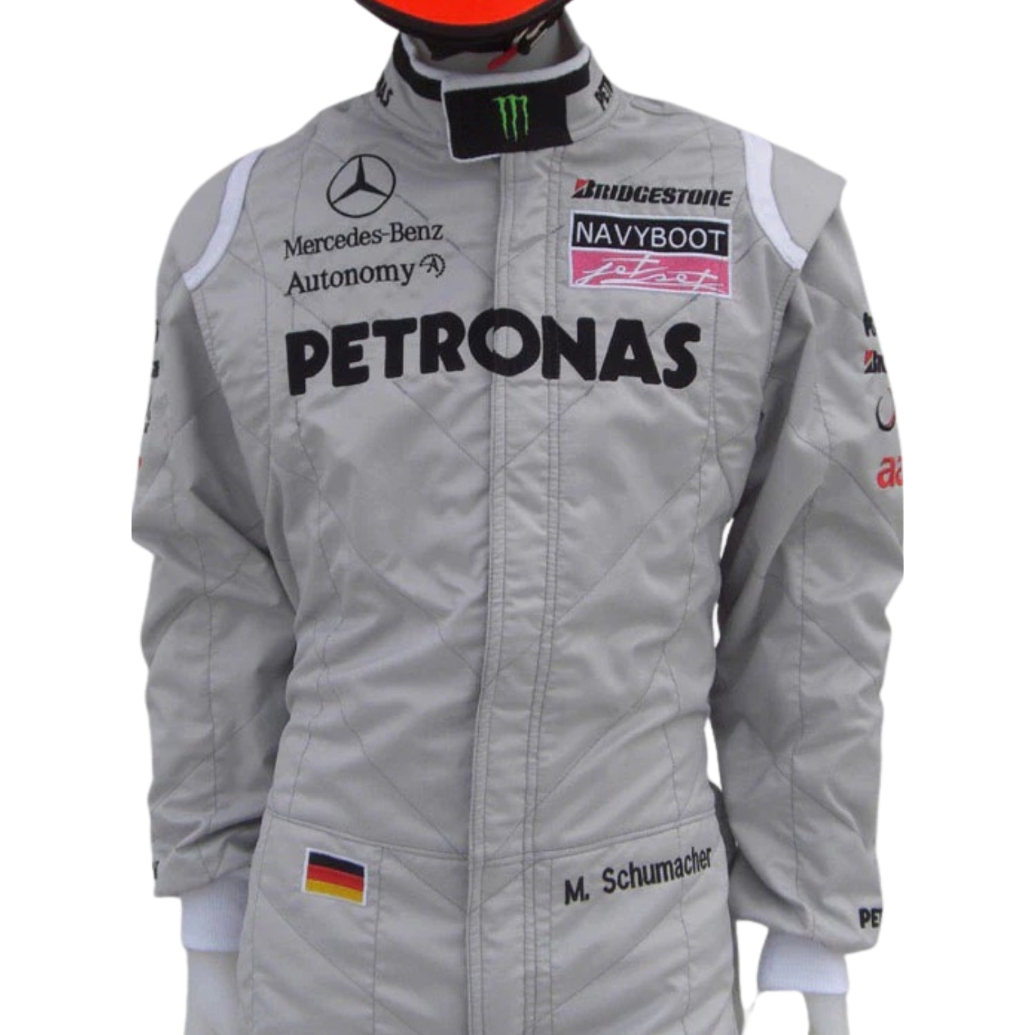 Detailed close-up of the upper chest and shoulder area on Schumacher’s 2010 suit, highlighting team logos and textured fabric stitching.