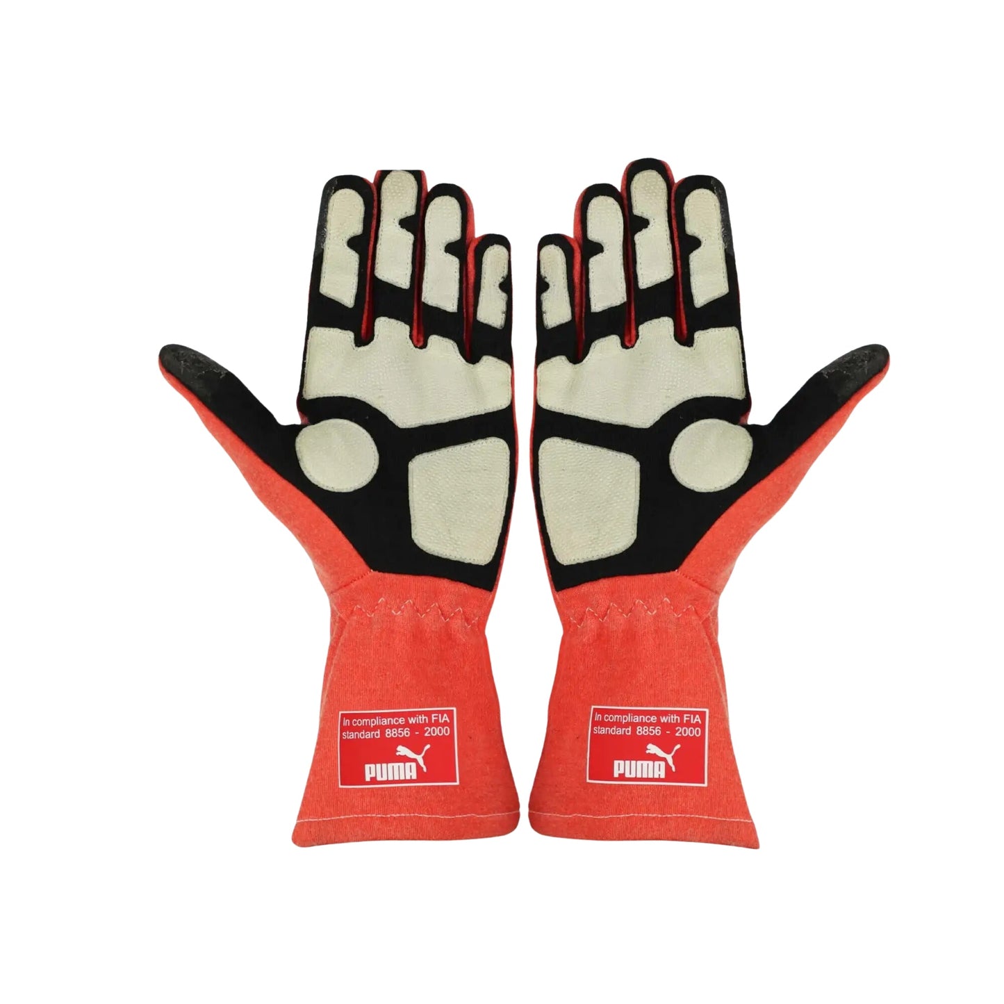 Pair of red Michael Schumacher 2012 F1 Racing gloves with black and white accents on a white background