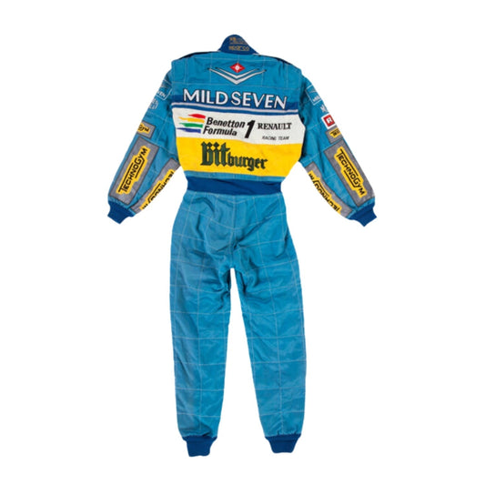 Backside of Schumacher’s 1995 racing suit, showcasing a green-dominated rear panel with blue sleeves and prominent yellow sponsor branding.