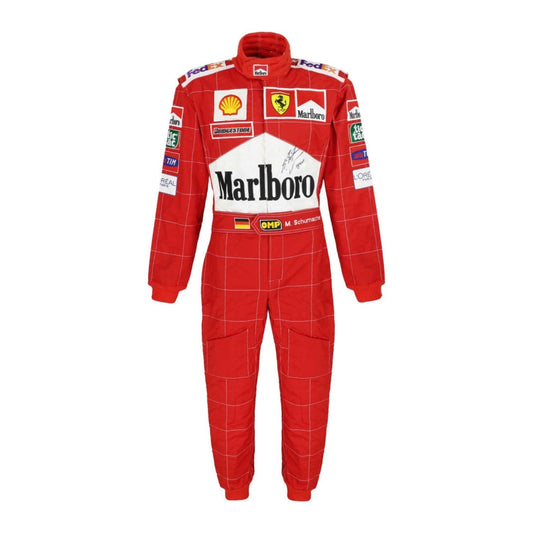 Front view of Michael Schumacher’s 2004 F1 racing suit in vivid red with white detailing, capturing the power and confidence of his record-setting season.